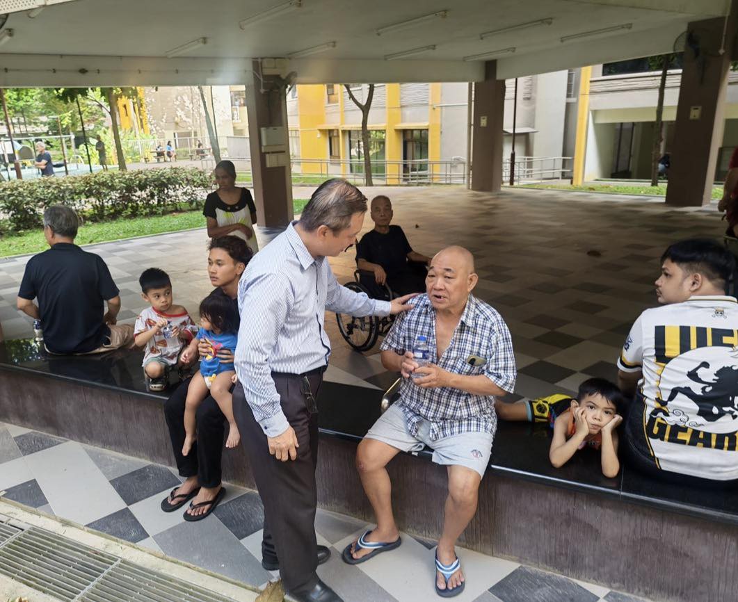 MP Lee talking to residents