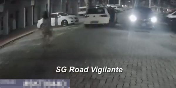 woman chases after car in Bedok