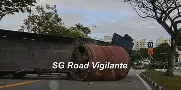 barrel falls off trailer in Sengkang