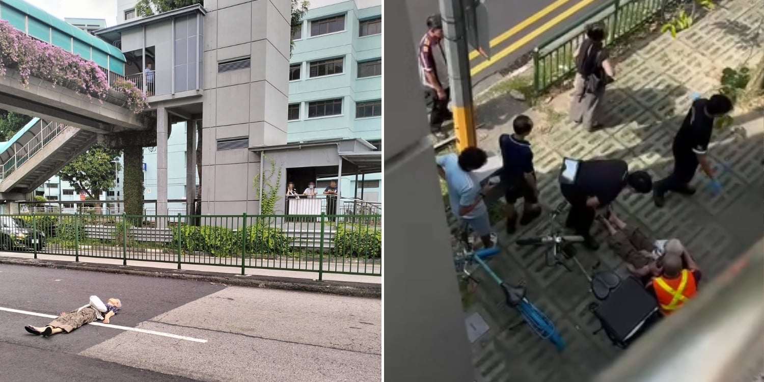 elderly woman lying down on road