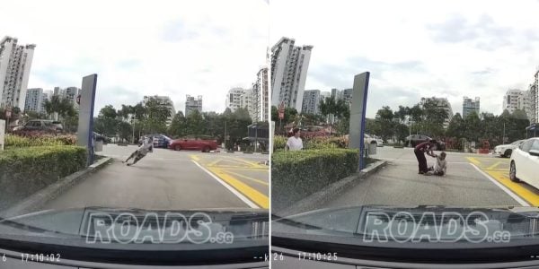 woman falls on road near Parkway Parade