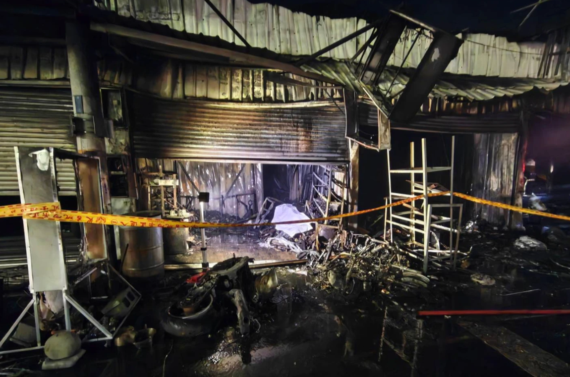 couple motorbike shop fire