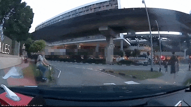 points at zebra crossing