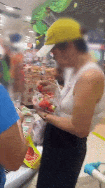 woman choosing strawberry
