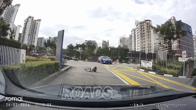 woman struggles to get up