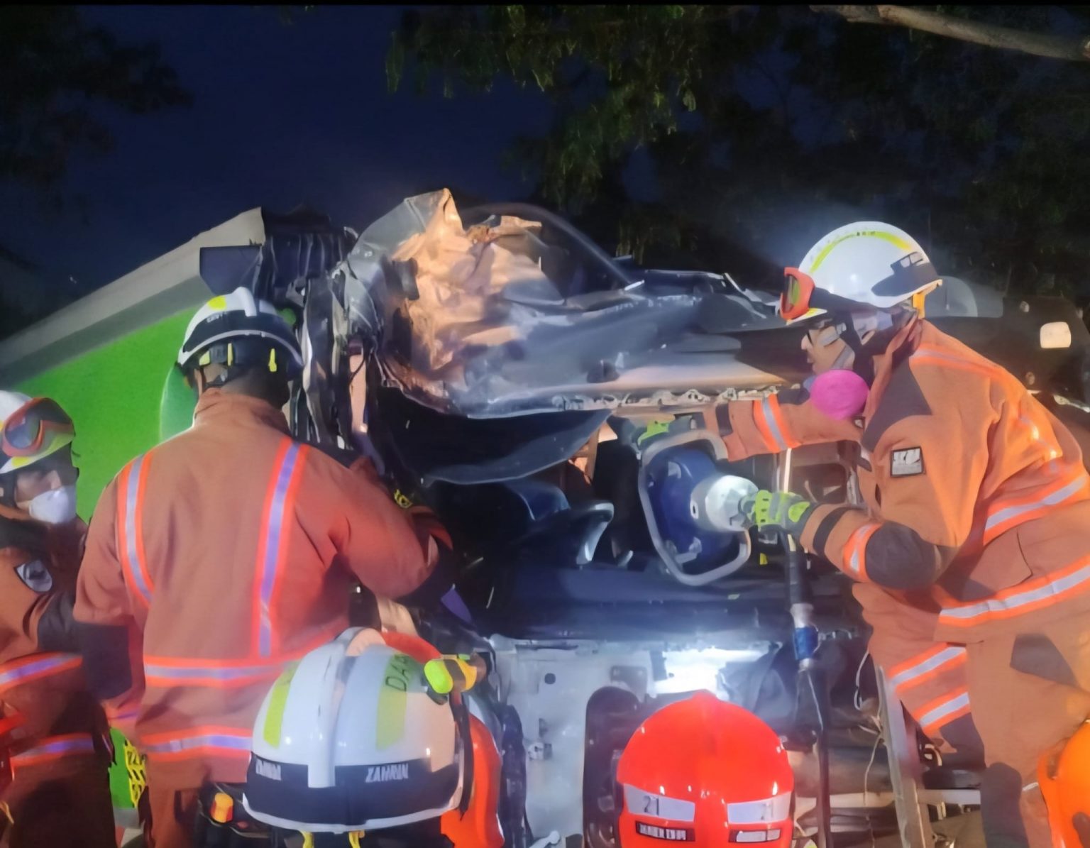 Driver trapped after garbage truck collides with tree in Hougang, gets ...