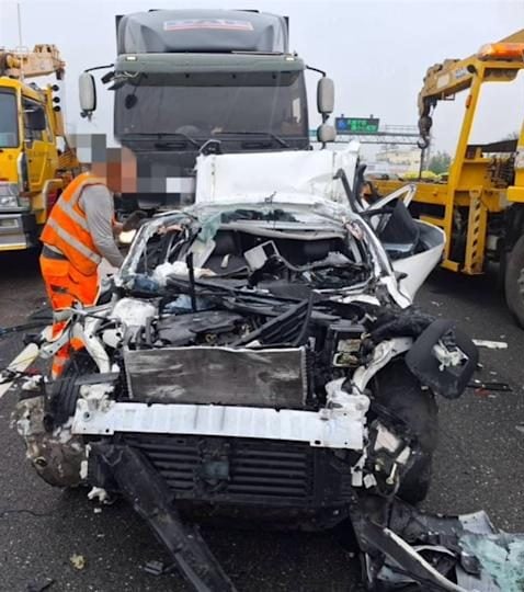 lorry crushes car