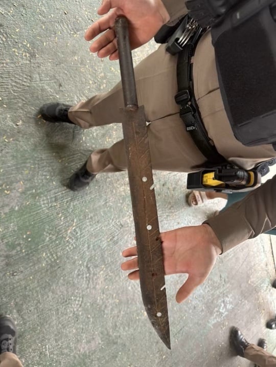 man barge home assault machete