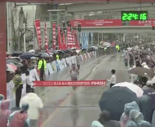 official suspended marathon winner crossing