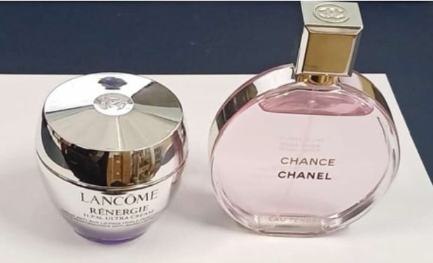 foreigners stealing perfumes