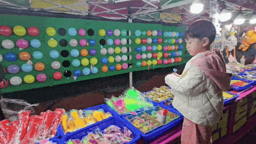 boy pops balloons dart (2)