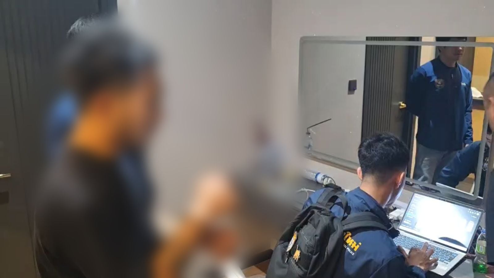 businessman hidden camera restroom laptop