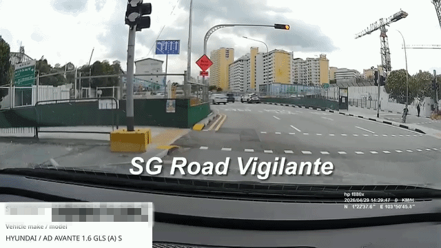 boy cycle across road