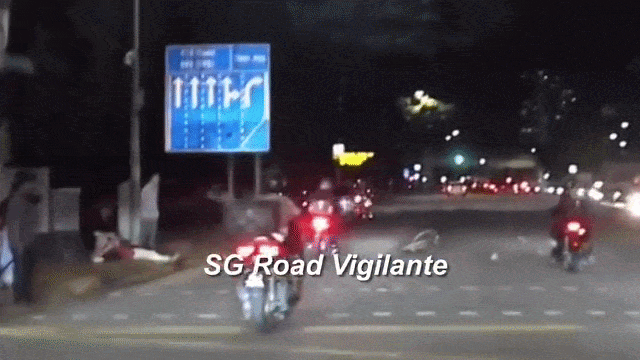 man lying on roadside