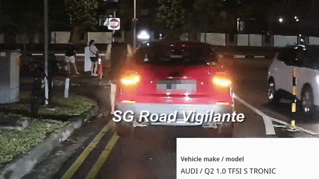 throws cigarette onto road