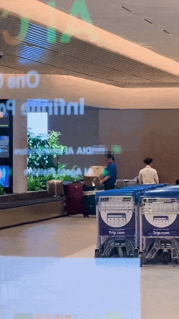 throwing package onto conveyor belt