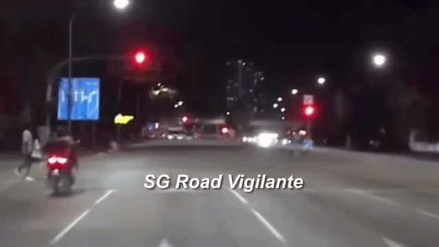cyclist riding across road