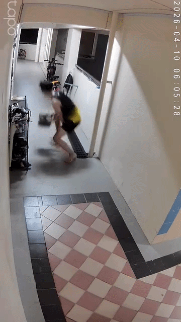 runs down hallway with shoes