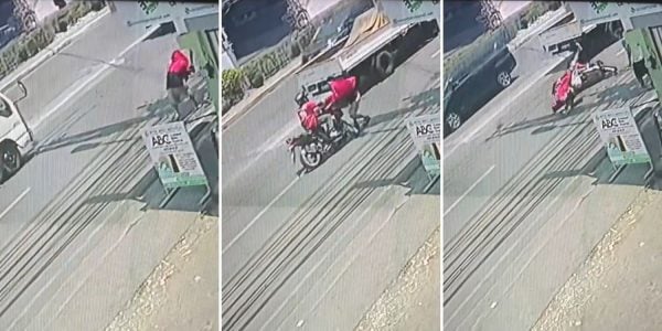 man snatches money hit motorcycle