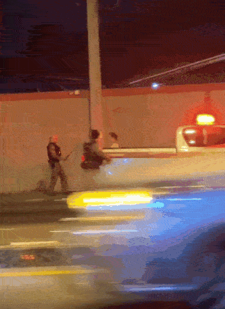 woman chases cop knife chase