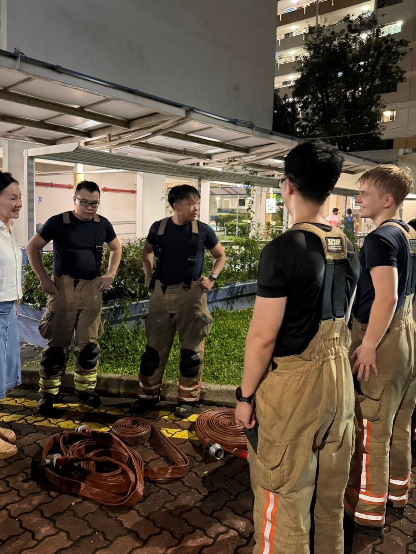 firefighters speaking to MP