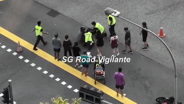paramedics attending to rider