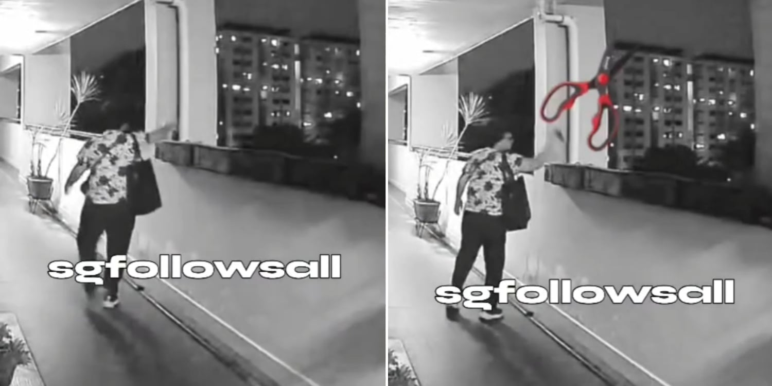 woman throws scissors down