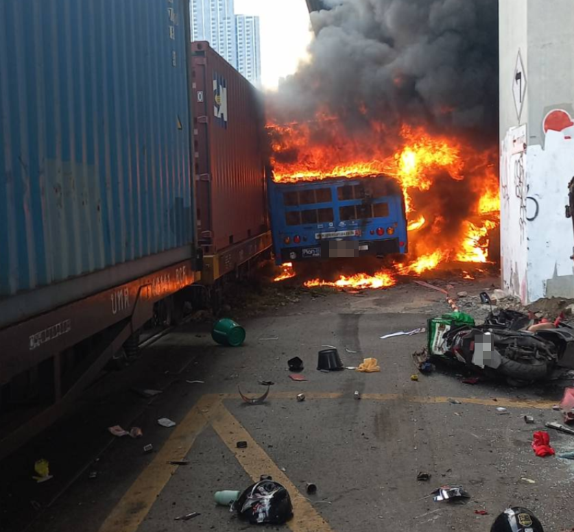 train crashes bus