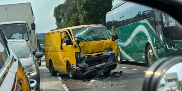 Van driver dies after being trapped in seat during accident with bus in Woodlands