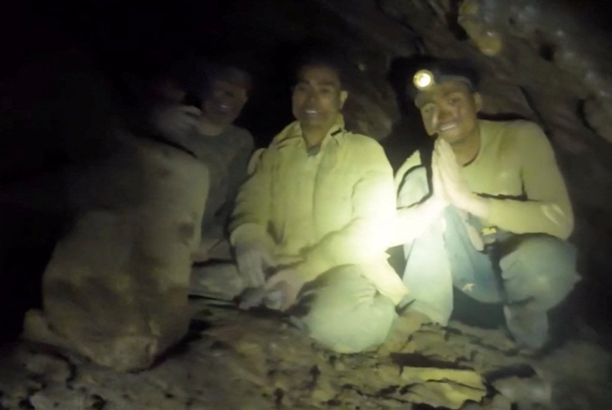 rescuers laos cave villagers