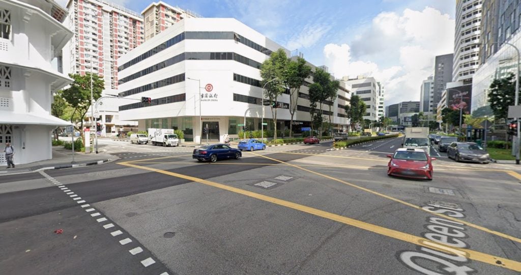 Woman crashes car into road divider in Bugis, heads for supper with ...