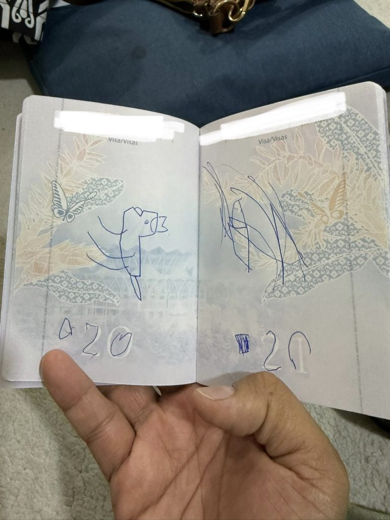 woman passport scribbles