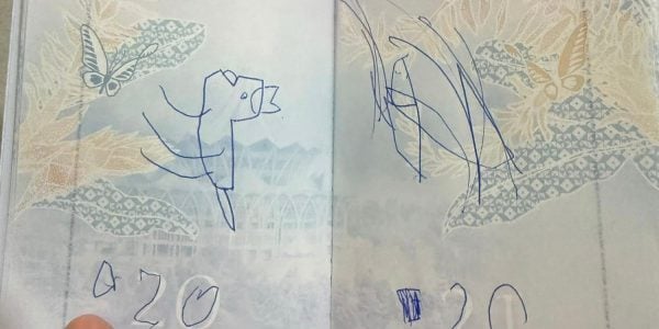 woman passport scribbles