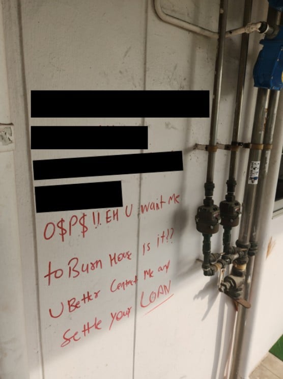 loanshark-related graffiti corridor
