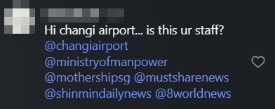 man squats airport