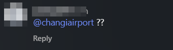 man squats airport