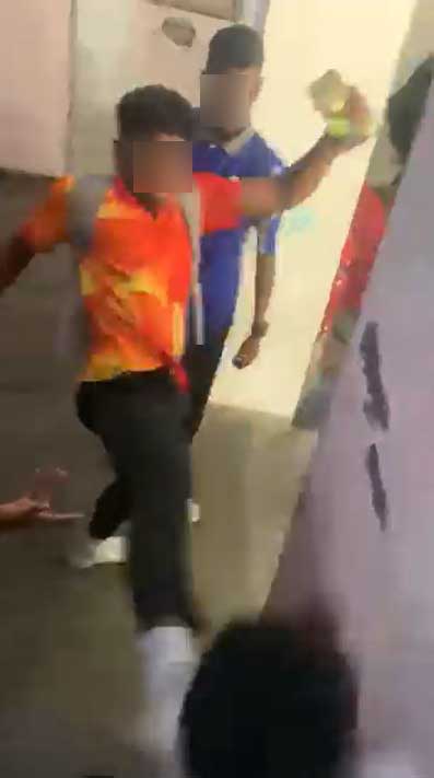 students assaulting classmate