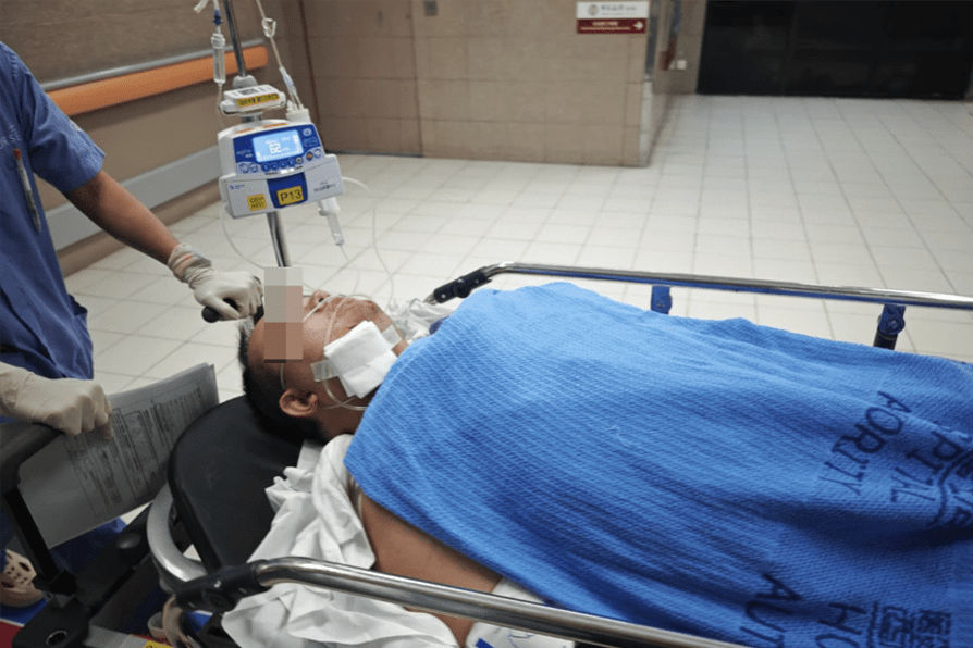 man stabbed neck