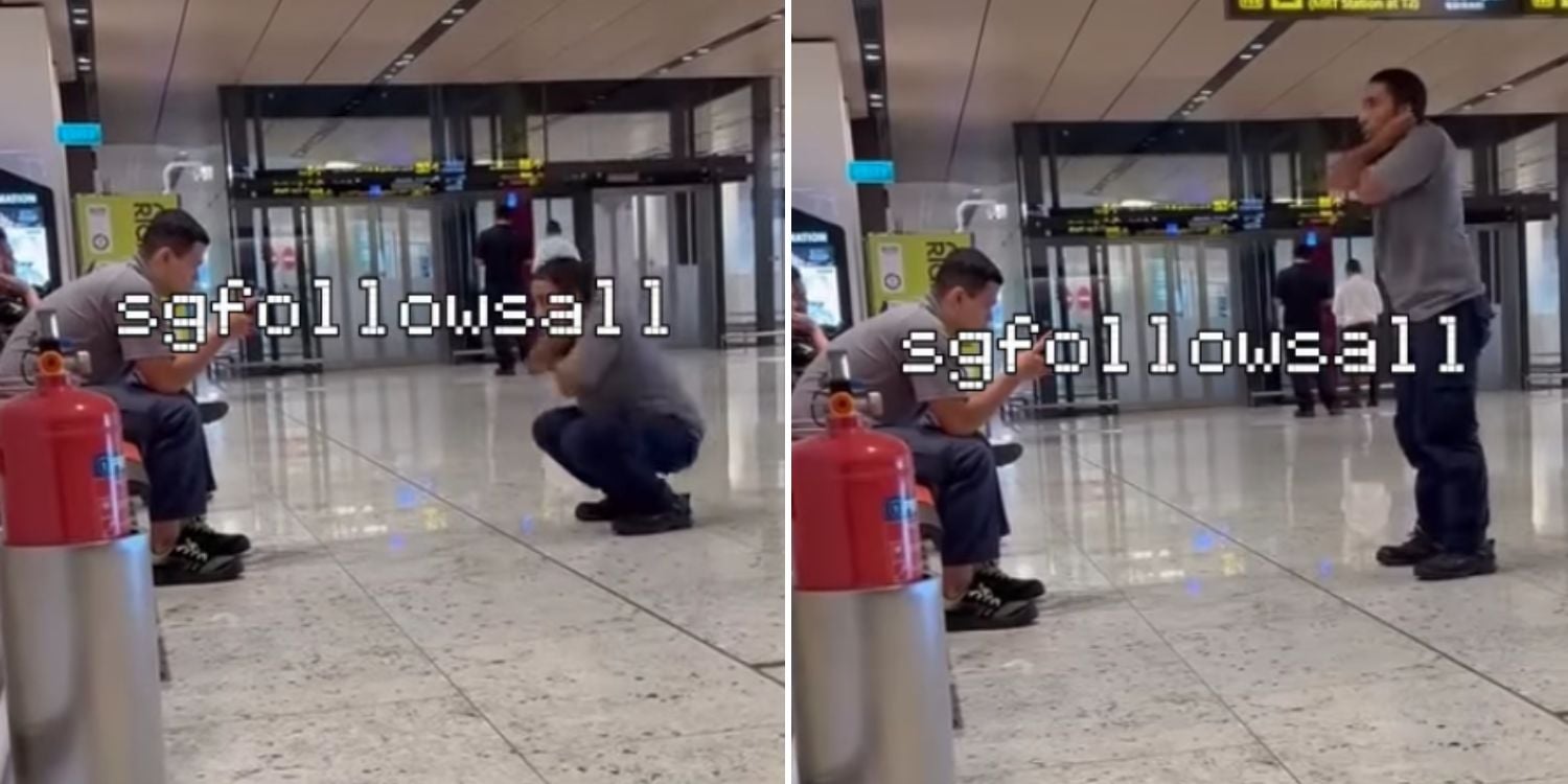 man squats airport