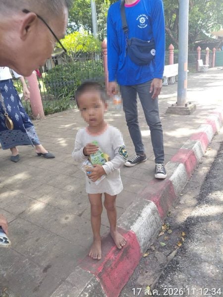 boy clinging truck