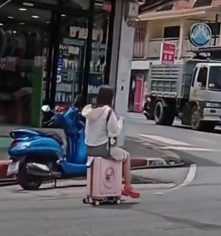 tourist rides suitcase