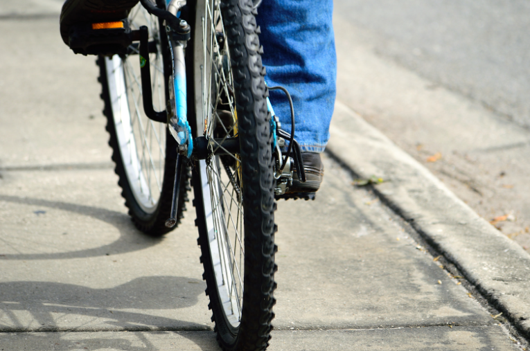 serviceman bicycle pedestrian